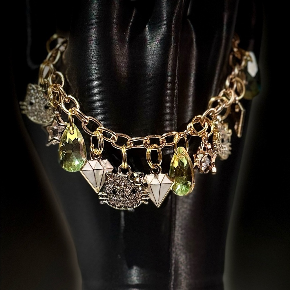 Elegant Gold Kitty Charm Bracelet with Green Accents